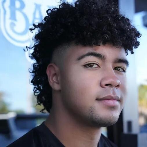 Curly top, outside the shop