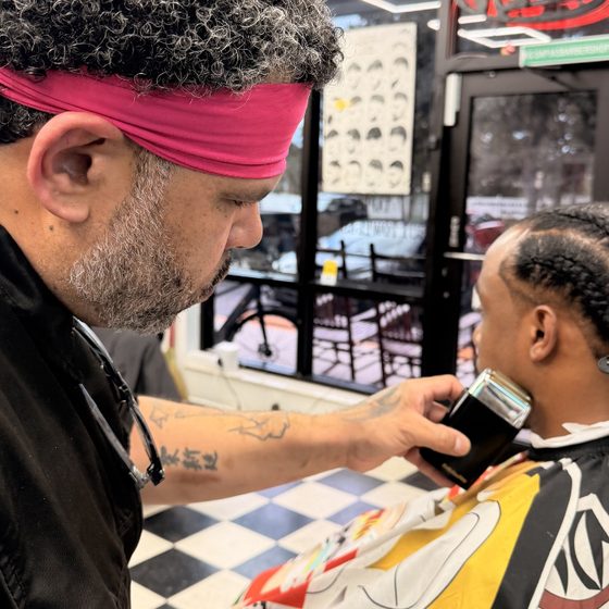 Juice, Barber at Sapia's Barber Shop